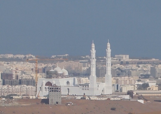 a new mosque under construction that looks like it's being built on a sand dune ???