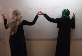 My studenst want me to photograph them making hearts and peace signs