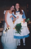 Sarah playing the part of Alice in Wonderland in high school